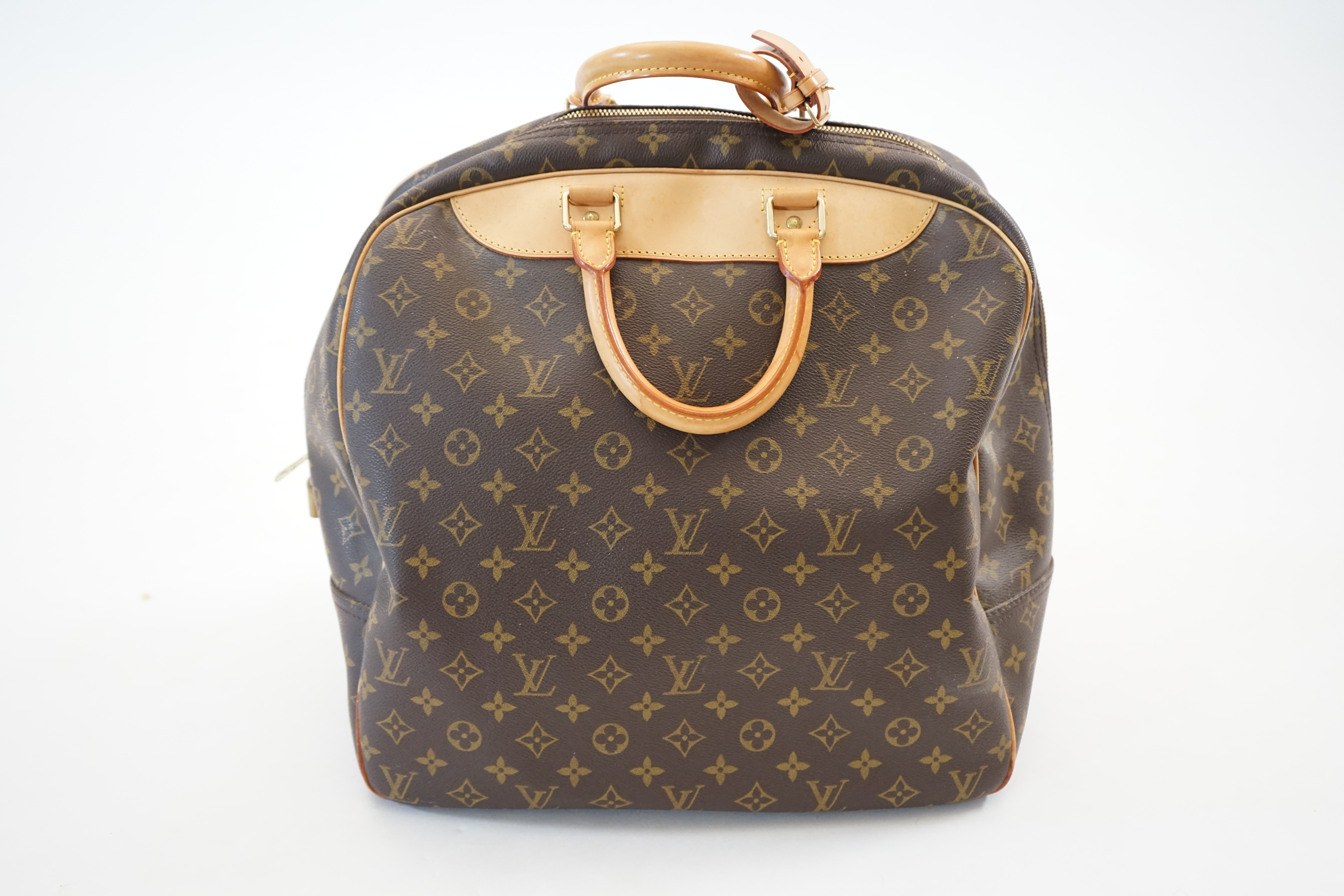 A Louis Vuitton Evasion travel bag width 38cm, depth 23cm, length 33cm, hand drop 12cm